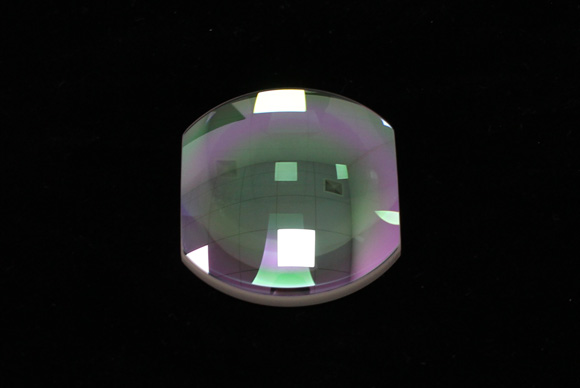 Trimmed aspheric lens